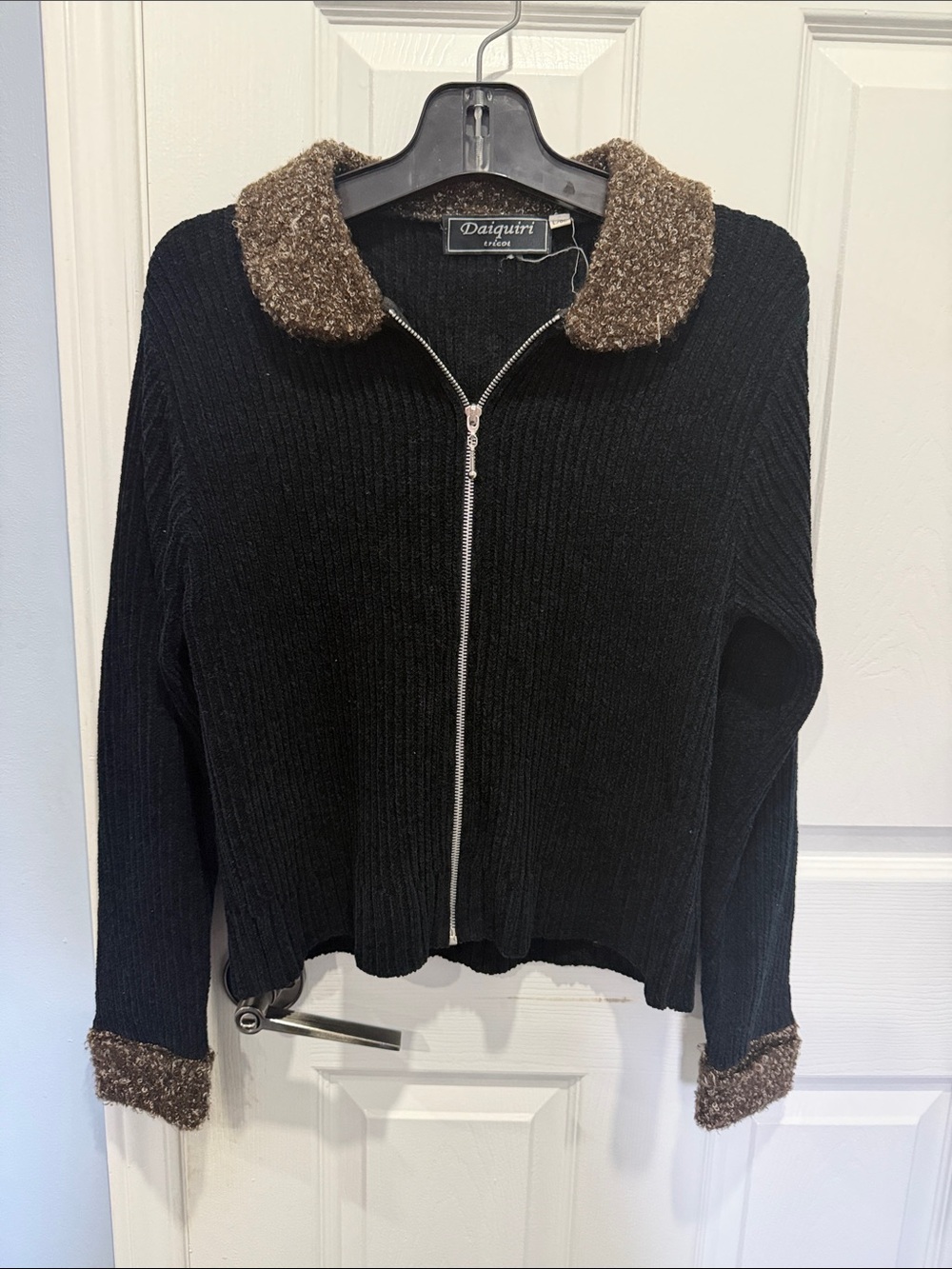 Daiquiri Black Sweater with Brown Curly Trim
